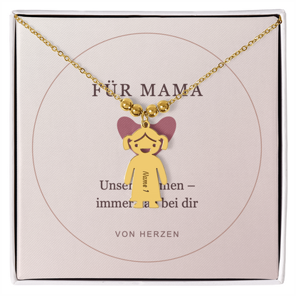 Goldfarbene Kette mit einem Mädchenanhänger und Motivkarte